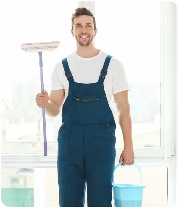 Cleaning Experts holding cleaning tools